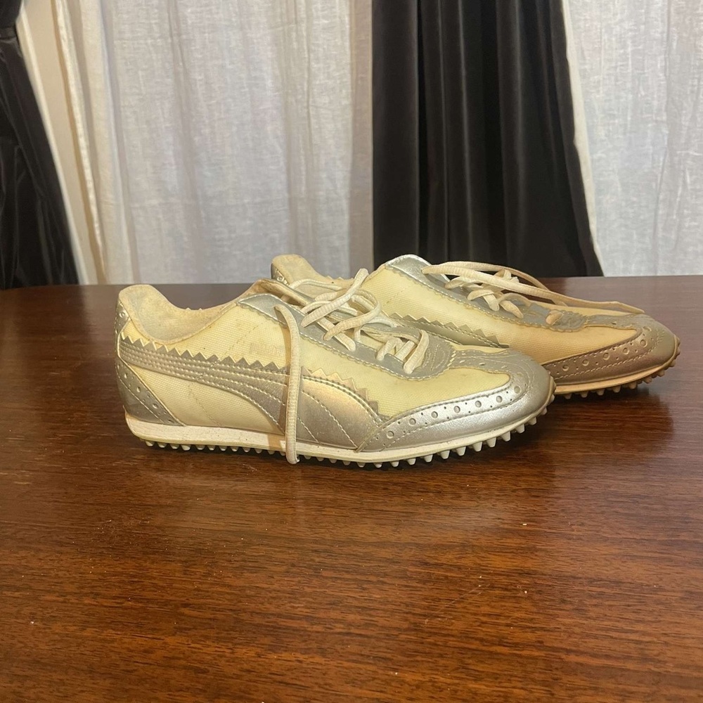 PUMA white a silver athletic shoes